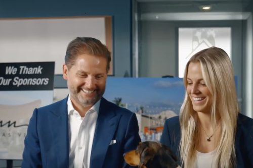 sam and ash smiling while looking at rocky