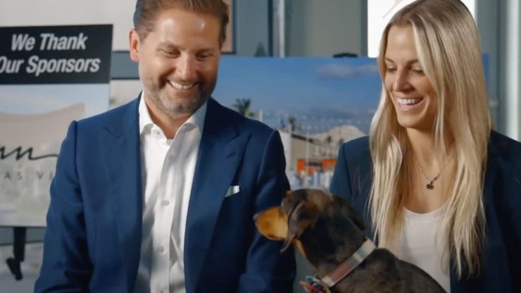 sam and ash smiling while looking at rocky