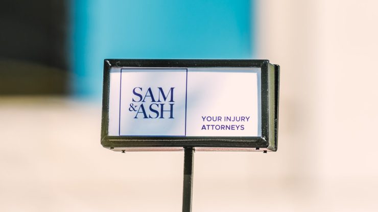 A professional sign displays