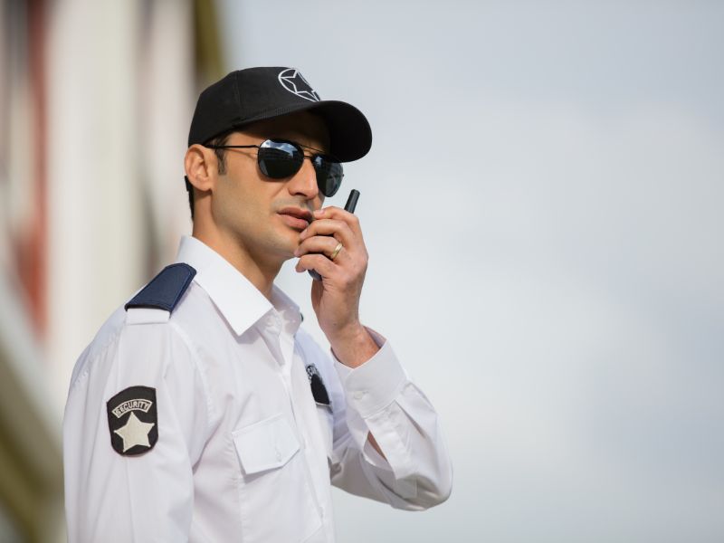 security guard talking on his walkie talkie