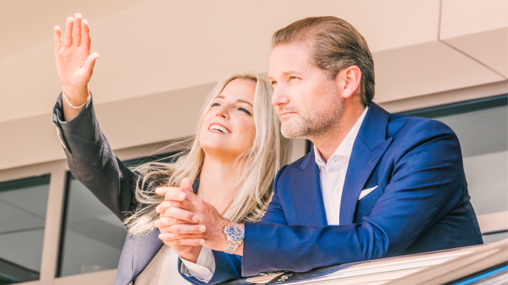 Two professionals engage in a thoughtful discussion, exuding confidence and care in a modern setting.