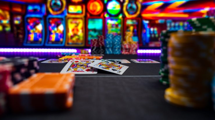 A vibrant casino scene conveys excitement, with colorful chips and cards symbolizing risk and strategy.