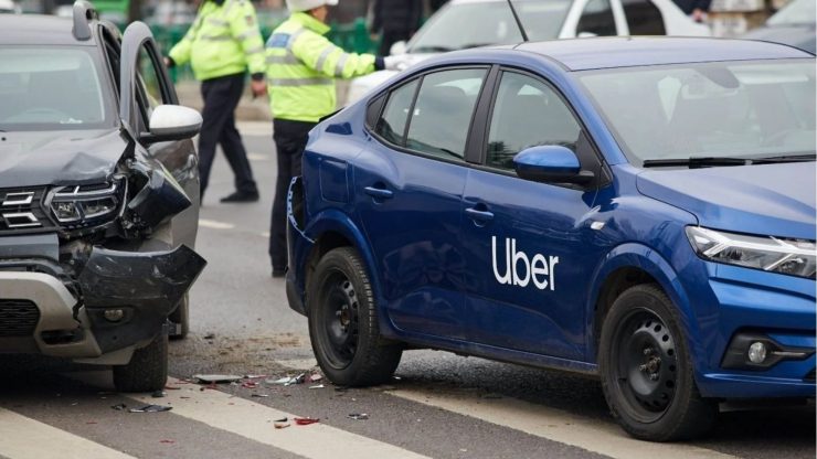 front of car smashed and back of uber car smashed