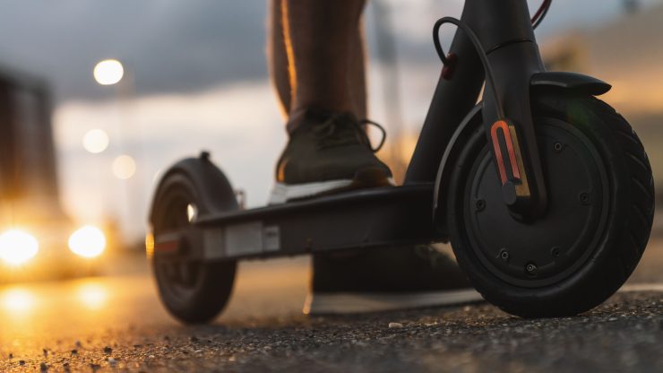 A focused view of a scooter, symbolizing mobility and the importance of safety in urban environments.
