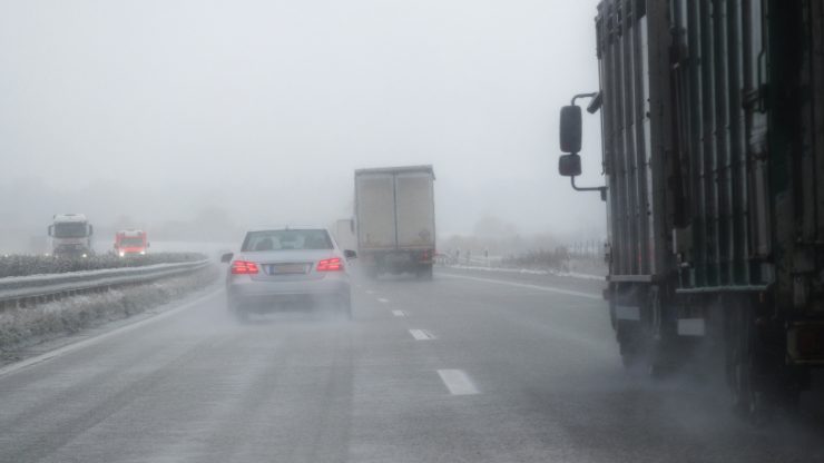 A challenging winter road scene emphasizes the importance of safe driving and legal advocacy.