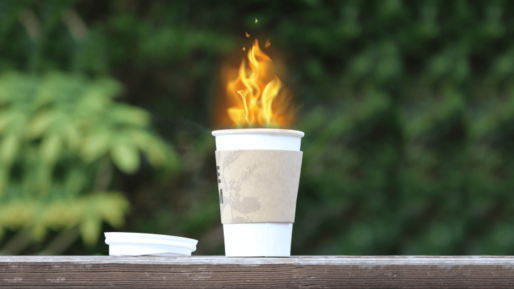 A coffee cup emits flames, symbolizing urgency and the importance of addressing personal injury concerns.