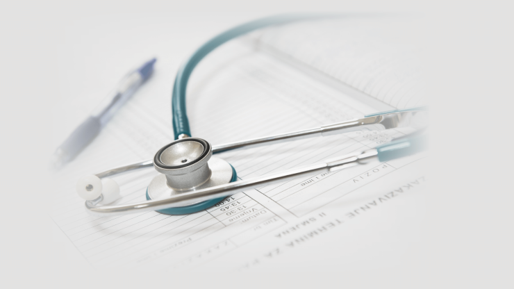 A stethoscope rests on a medical chart, symbolizing care and professionalism in personal injury advocacy.