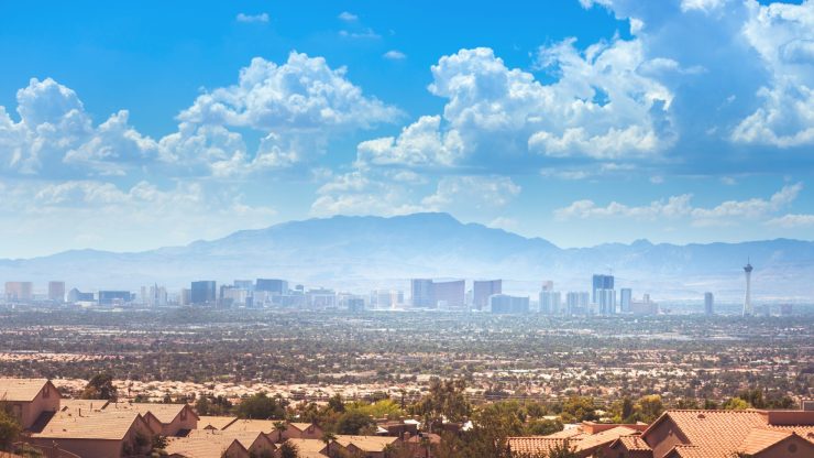 A panoramic view of a vibrant cityscape, reflecting resilience and community strength.