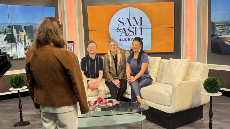 A confident team engages in a professional setting, reflecting care and advocacy for clients.