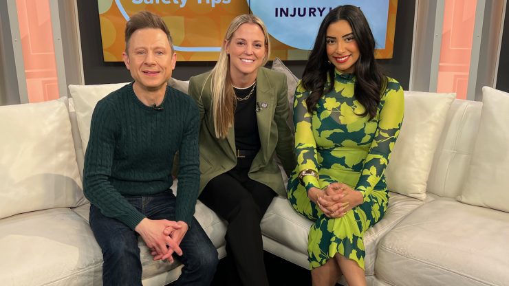 Three professionals seated on a modern set with St. Patrick’s Day safety tips and personal injury firm branding.