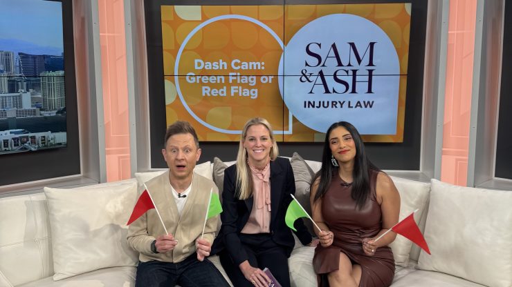 Three hosts engage in a friendly discussion on injury law, holding red and green flags for debate.