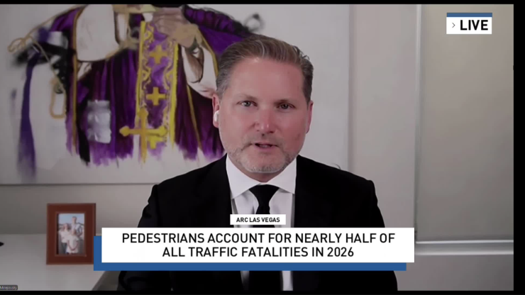 Confident professional providing expert legal insight on pedestrian traffic fatalities in a formal setting.