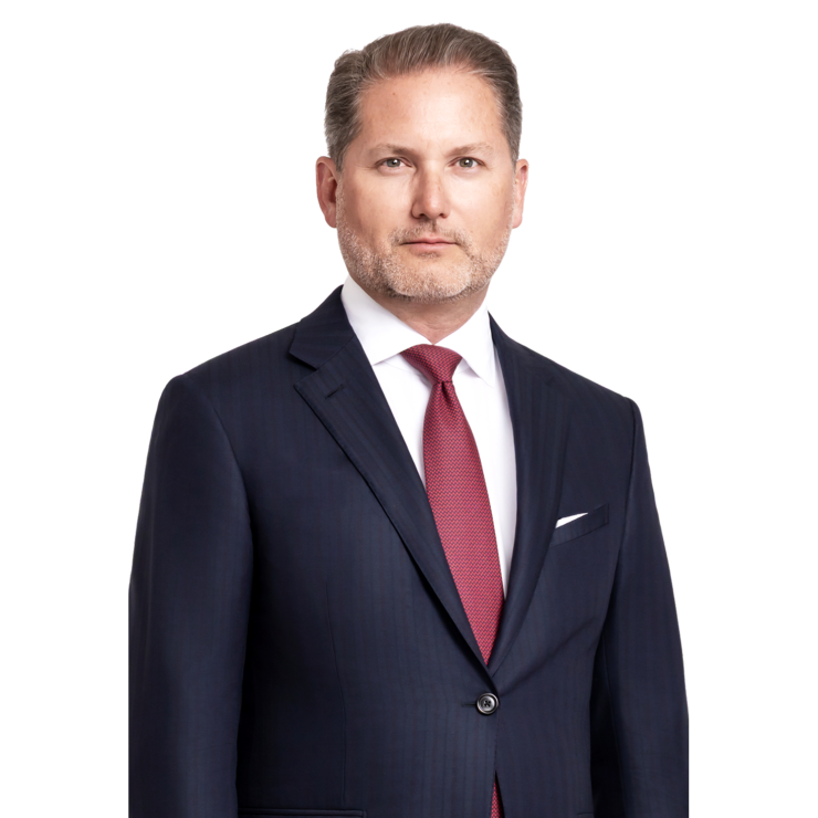 Confident professional man in dark suit and red tie exuding trust and advocacy on white background